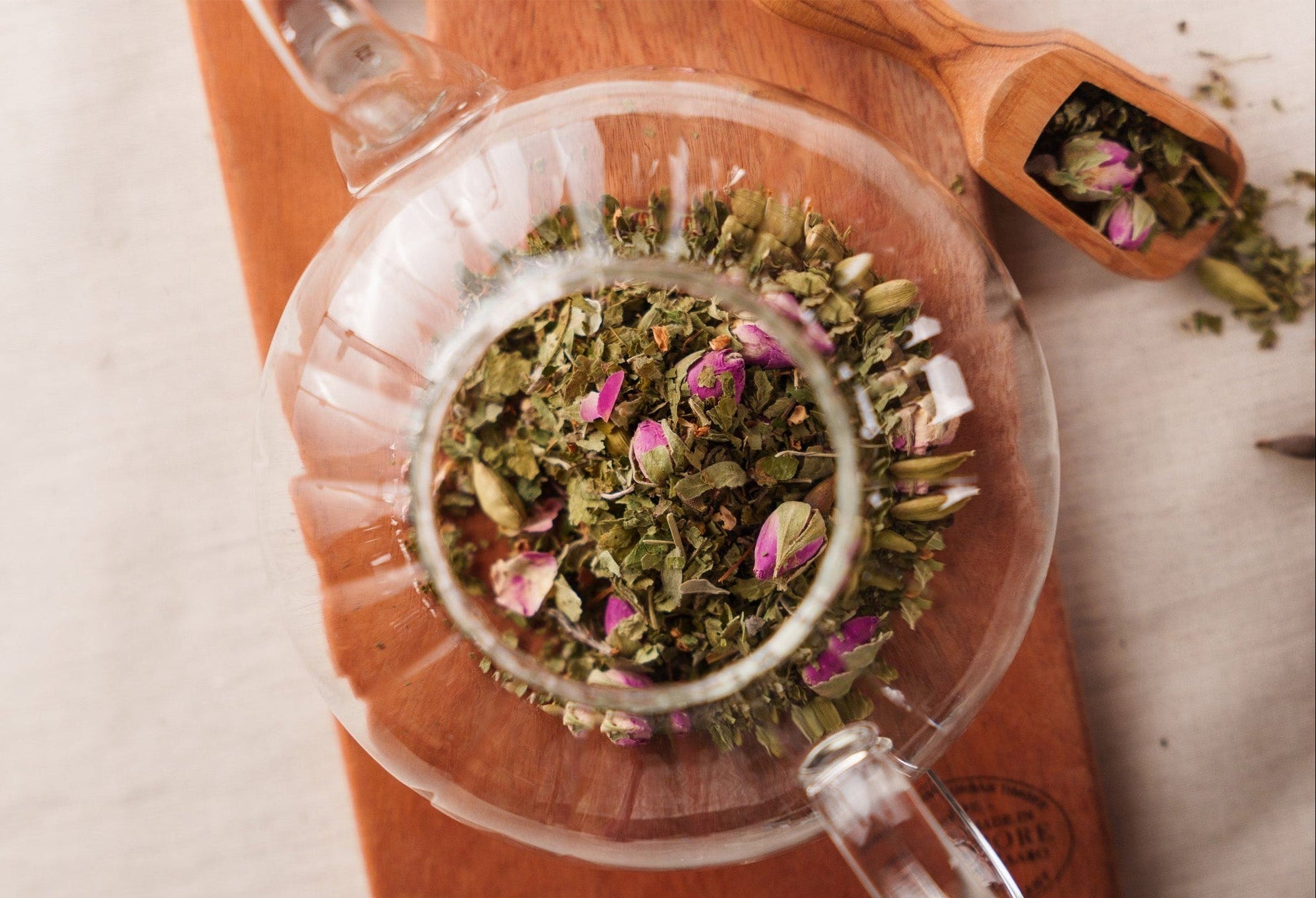 Lavara Botanics herbal blend tea infusion in a transparent pot