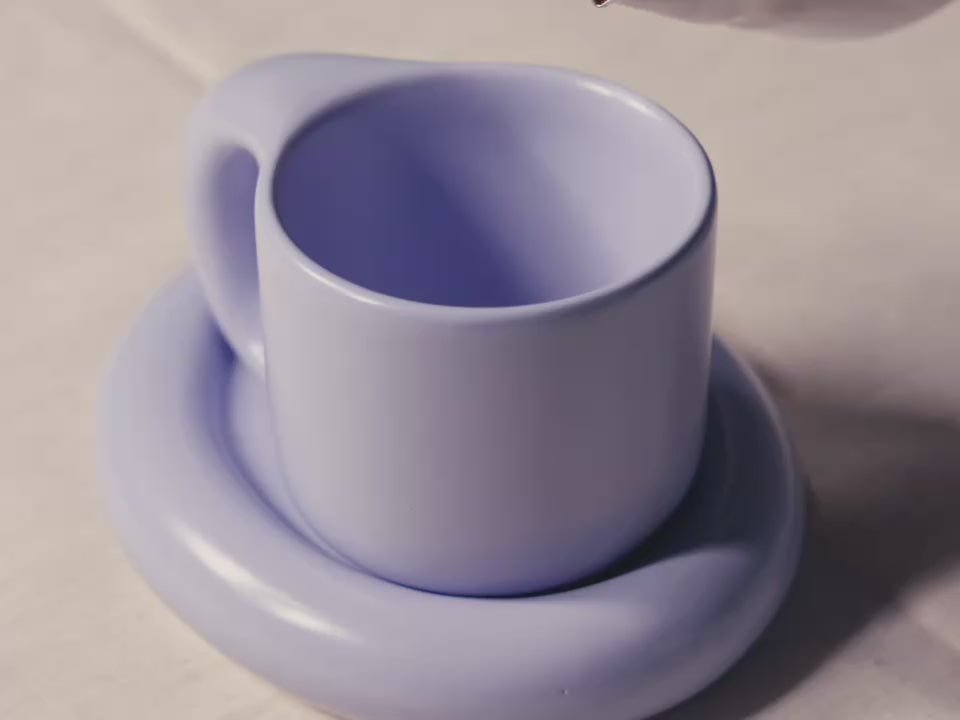 Lavara Botanics organically certified rose cacao poured into a purple cup